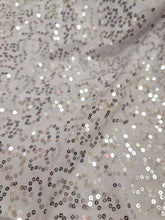 Load image into Gallery viewer, Fabric Sold By The Yard Silver Sequin On White Jersey Knit Stretch Fashion Fabric Dress Draping Clothing Decoration
