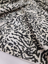 Load image into Gallery viewer, Fabric By The Yard Animal Print Pattern Stretch Jersey Knit Cheetah Soft Fabric Dress Clothing Decoration Background Draping Black and White
