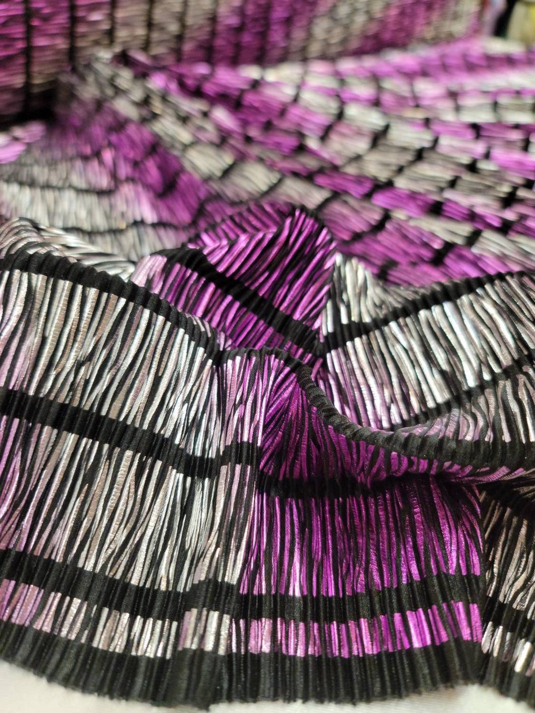 Magenta and Silver Metallic Pleated Stretch Fabric By The Yard On Black Textured Fabric Dress Clothing Decoration Background New